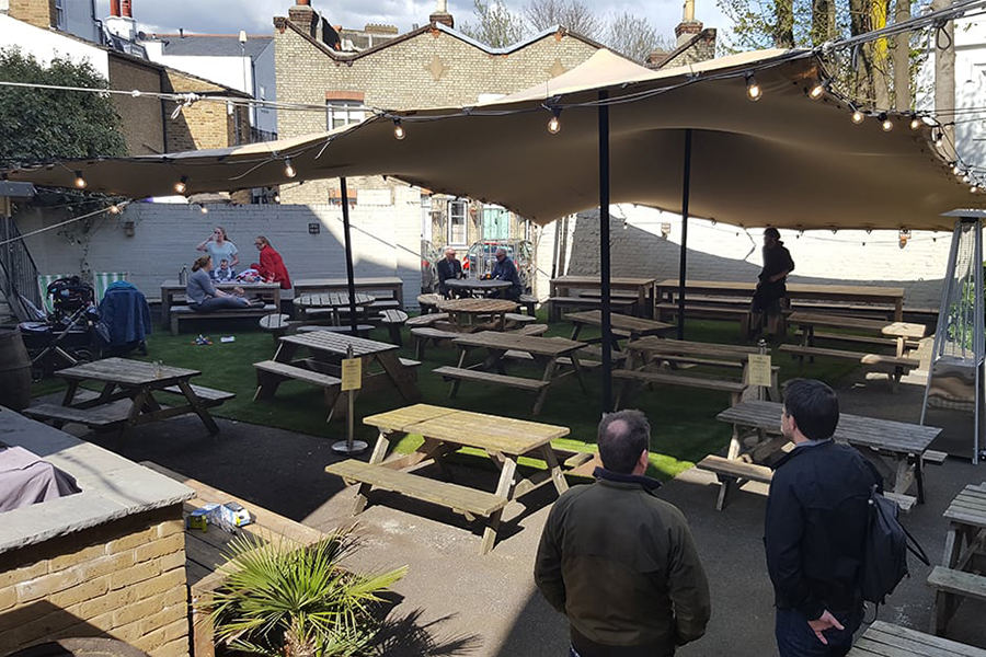 Stretch marquee over pub beer garden 